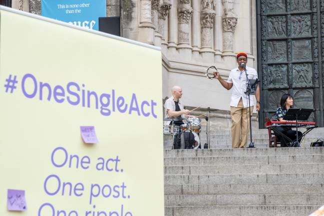 A #OneSingleAct board where people can leave sticky notes with thoughtful messages.