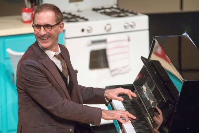 Mark Nadler performs a number from “I’m A Stranger Here Myself” at a ceremony dedicating new seats at the York Theatre last week. Photo: Ben Strothman.