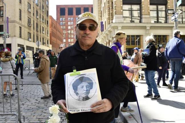 Michael Lupinacci holds photo of his great great aunt Santina Salemi who died in the fire. Her cousin Frances, was also in the shirtwaist sweatshop that day, but survived.
