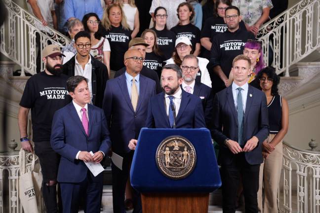 Gathering at City Hall just before passage of the historic legislation were leaders that included Planning Commissioner Dan Garodnick (first row, left) and the City Council members who co-sponsored the bill, Keith Powers (at mic) and Erik Bottcher (front row, right).