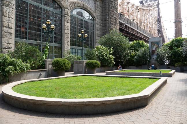 The green space in the park plaza at the foot of the Queensboro Bridge is a battle ground between local residents and high-end event venue Guastavino’s which they say has been co-opting the public space for private parties.