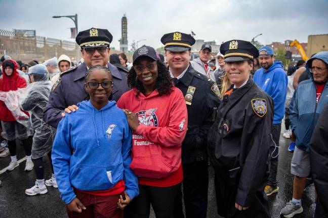 Cops and other await the start of Tunnel to Towers 2026 in Red Hook, Brooklyn.
