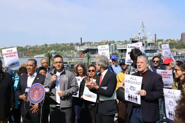 City Council Member Shaun Abreu (center) and Manhattan B.P. Brad Hoylman-Sigal (center-right) are trying to kickstart World Cup ferry service from W. 125th Street.