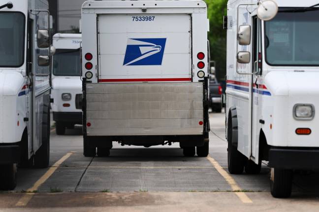 A USPS driver has since been charged for fleeing the scene and is set to go to trial Sept. 25.