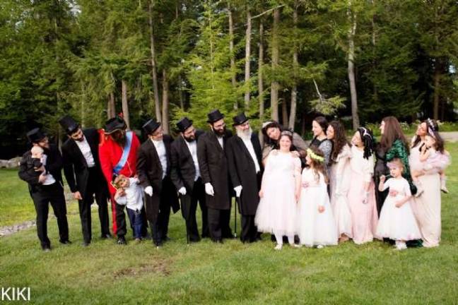 Brocha, center, and her family.