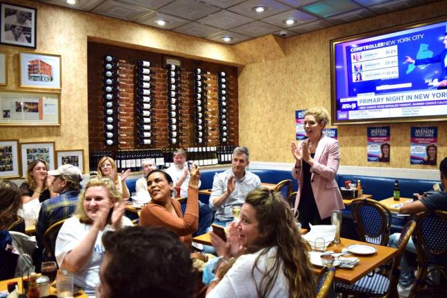 Julie Menin with supporters at The Mansion diner on the Upper East Side on primary night. Photo: Emily Higginbotham