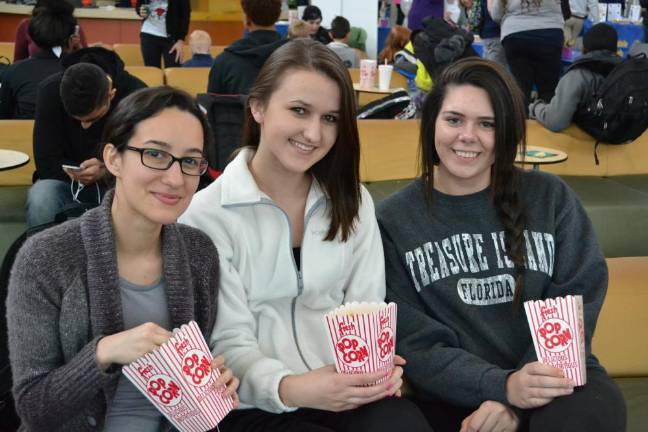 Popcorn today is a nutritious snack enjoyed at outdoor sporting events. But in ancient times, popped corn was used in religious rituals. Photo: Robyn Johnson/Wikimedia Commons