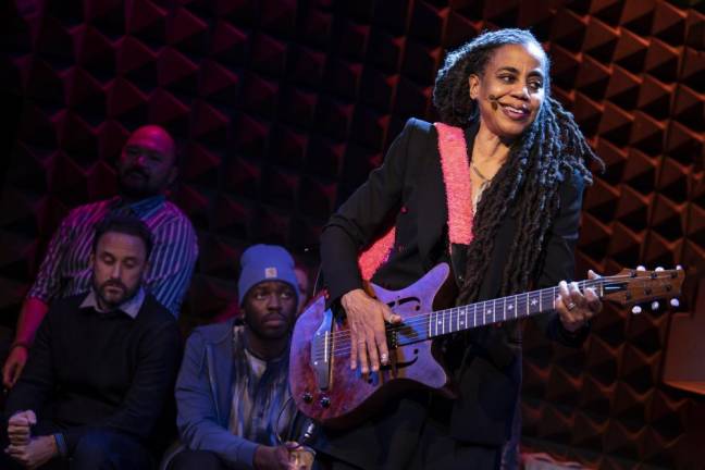 Suzan-Lori Parks playing guitar as part of her new production, “Plays for the Plague Year.” Photo courtesy of The Public Theater