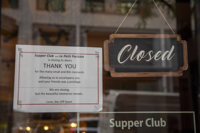 As the venue is moving out of the location, a sign is placed by the entrance door for customers. Two locations remain in Manhattan, one in Lenox Hill and one in the East Village.