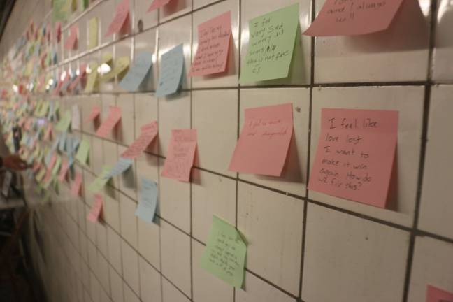 At the Union Square station, Post-its affixed to a wall reflected post-election frustration. Photo: Micah Danney