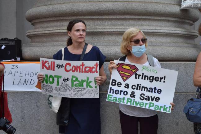 Signs at the protest in support of East River Park. Photo: Emily Higginbotham
