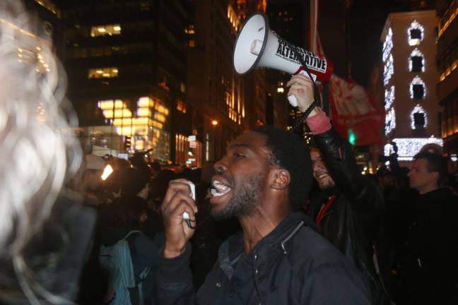 Thousands marched in city streets Wednesday night to express their displeasure and frustration at election results. Photo: Micah Danney
