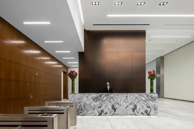 The building is considered a high-end “Class A” property, making it a draw for significant tenants such as Compass and Magnetar Capital.