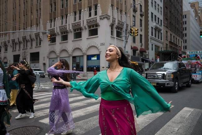 Persian Day Parade on Madison Avenue, April 19 celebrated Iranian culture with women and men in flowing traditional clothes from a time before the theocratic regime was installed.