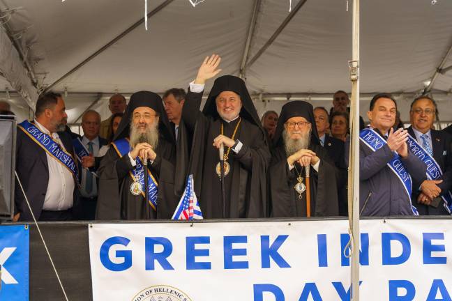 Greek Orthodox priests on a float. March 30, at the Greek Independence Day parade heading up Fifth Ave.