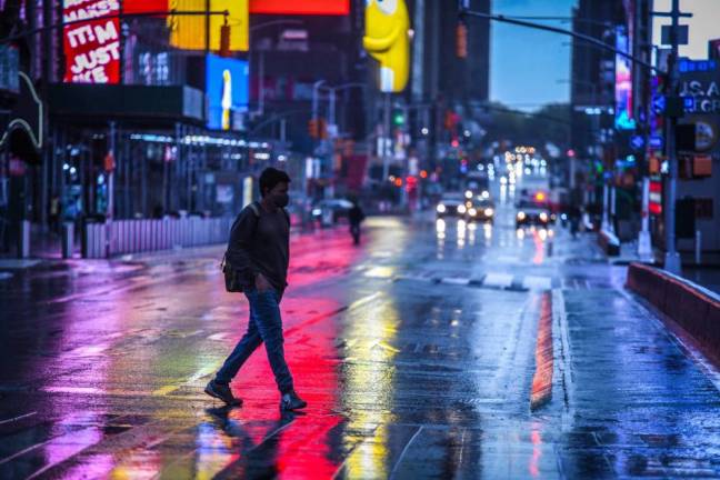 A rainy and empty Times Square on Monday, May 11, 2020.