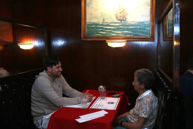 Addie Guttag (right) sitting with her nephew, David Guttag (left) for lunch. Addie has been coming to Donohue’s Steak House for 58 years. David has been coming for nearly his entire 43 years of life.