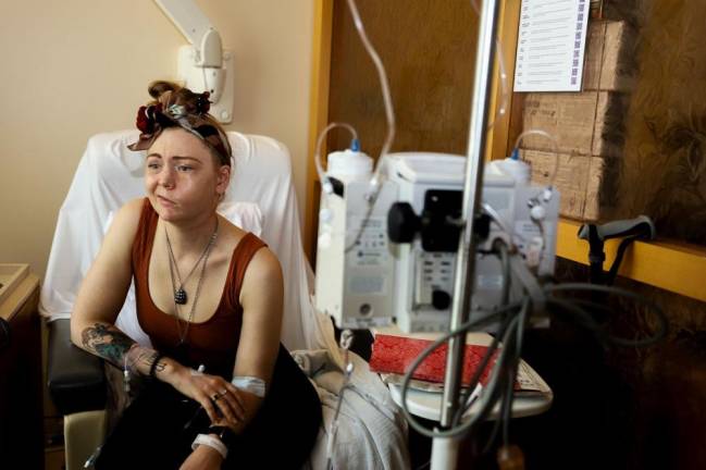 <b>After a 15 hour surgery, the adenoid cystic carcinoma in her facial nerve was removed from Alyssa Kitt’s face and a new nerve was transplanted from her hip as she begins a six to 12 month recovery.</b> Photo: Ash Marinaccio