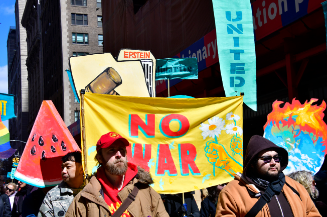 At its peak, a peaceful protest stretched for more than a mile down Seventh Ave. on March 28. The war in Iran appeared to swell ranks of protestors.