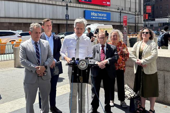 Manhattan Borough President Brad Hoylman-Sigal (at mic) mc’d a press conference outside Madison Square Garden on the morning of June 7 that included (from left) Assemblymember Tony Simone, newly elected City Council member Carl Wilson, Congressman Jerry Nadler, NYS Senator Liz Krueger and Reinvent Albany senior policy advisor Rachael Fauss.