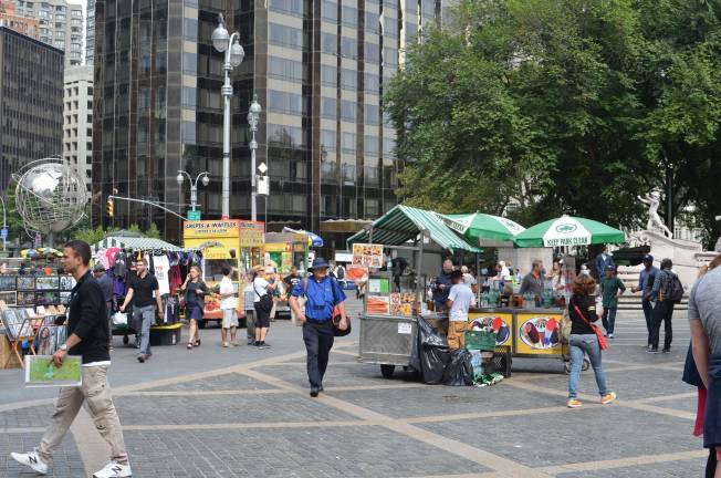 Merchandise vendors at Columbus Circle. Photo by Daniel Fitzsimmons.