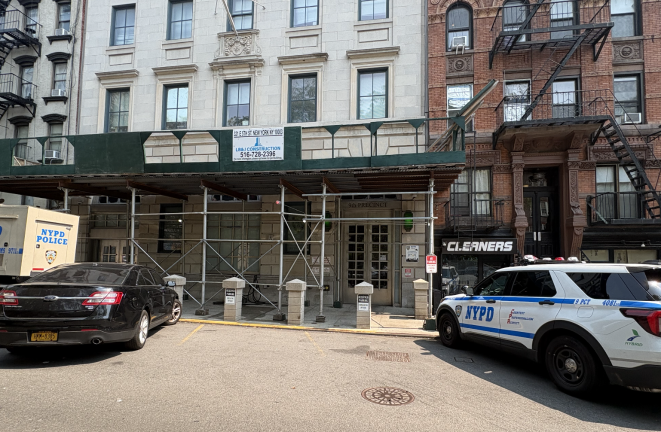 The 9th Precinct building, located across the street from the parking lot.