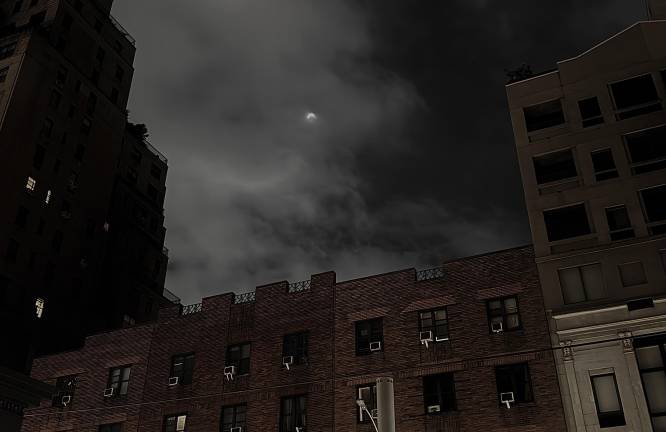 The partial eclipse could be seen on West 23rd Street between 8th and 9th Avenues.