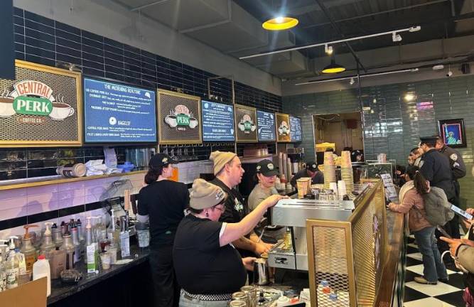 There are a lot more baristas behind the counter at Central Perks–a new cafe that draws its name from the fictional coffee house in Friends–than there were in the tv version that ran for ten years on NBC and is now in syndication. It’s a full functioning cafe that borrows a famous name from a tv show.