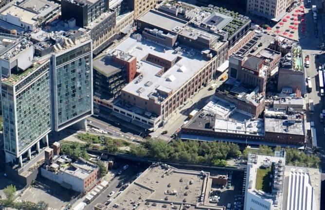 <b>Many of the trees on the HIgh Line have shed their leaves, but free guided tours are still given during the winter months on Wednesdays at 10 a.m. and Saturdays at noon. Here, the line goes over Little West 12th and ducks under the Standard Hotel. </b> Photo: Ralph Spielman