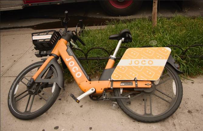 One of the JOCO e-bikes pulled from the back of the cargo truck.