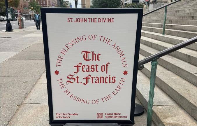 The sign out front of the Cathedral of St. John the Divine lets all know the blessing of the earth and animals in conjuntion with the Feast of St. Francis of Assisi is on.