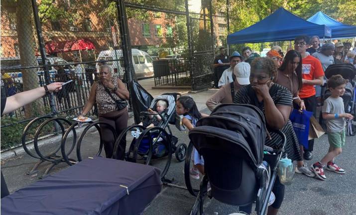 The longest line of the day was at the Starbucks booth until someone from the Community Council announced that there were no more juices available.
