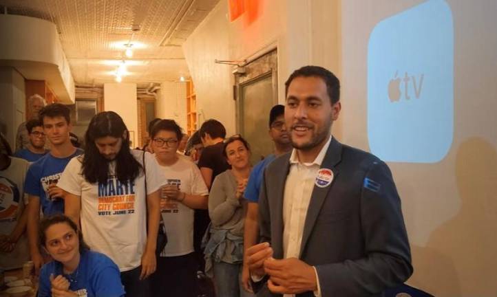 Christopher Marte, who capitalized on the coalition he created in 2017 when he challenged Council Member Margaret Chin, at his primary night event on Canal Street. Photo courtesy of Todd Fine