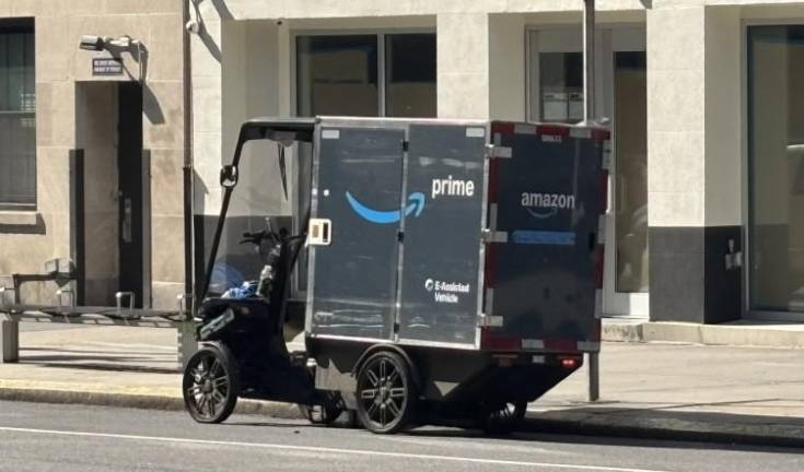 An Amazon Prime delivery vehicles parked on East 57th St. on July 26. Days earlier, the driver of a similar vehicle was charged with two felony assults after he exchanged words with a 79 year old man and then did a U-turn and drove into him, knocking him to the ground.