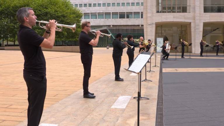 A 15-piece brass ensemble from organizations across Lincoln Center performed “Invictus” led by composer Anthony Barfield last summer. Photo courtesy Lincoln Center
