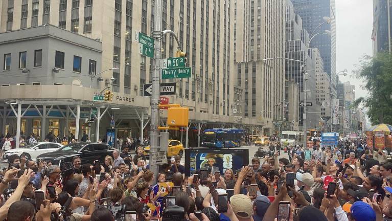 NYC Council Member Virginia Maloney unveiled the new street name ‘Thierry Henry Way’ at a ceremony outside Radio City Music Hall June 10. (Photo: Jacqueline Gordon)