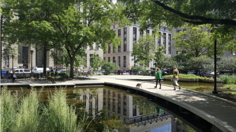 Collect Pond Park as it was intended to be, with two ponds and a bridge between them.