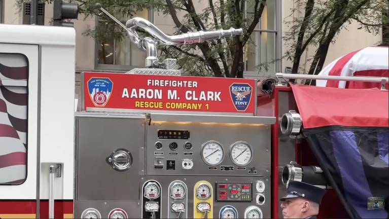 Firefighter Aaron M. Clark Rescue Company 1 funeral truck outside St. Patrick’s Cathedral, Sept. 29, 2025.