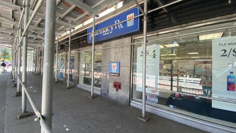 The store on 1191 Third Ave. has been operating underneath a sidewalk scaffolding shed.