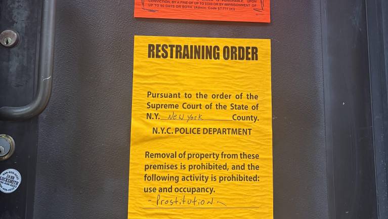 A court order slapped on the front door of Zen Spa says it was being used for prostitution,
