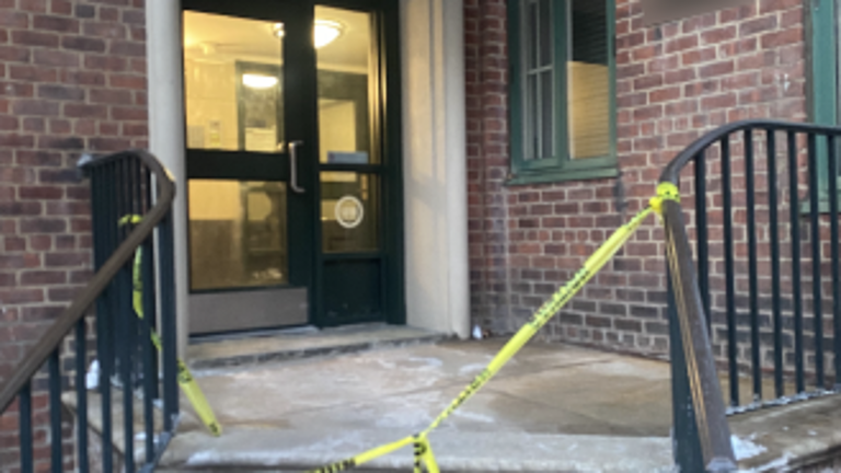 A crime scene on Jan. 29 (above). The suspect was said to have first trailed a woman into an elevator in a different building in Stuyvesant Town but left when he encountered another person in the elevator. He then walked across a sidewalk to the above building where he attacked a 14-year-old girl, the DA charged.