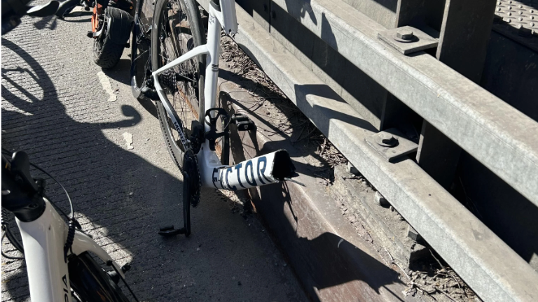 Image of the broken bike and electric scooter following the collision.