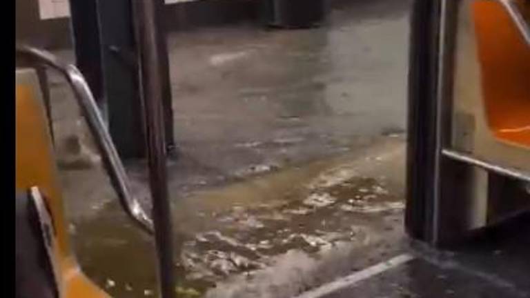 Water flows into a subway car at the W. 28th St. station during a record setting downpour that hit the city on July 14. Subway service was still interrupted by the Tuesday, July 15 rush hour.