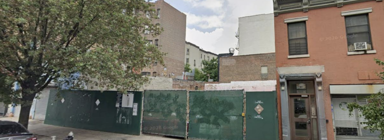 The vacant lot at 247–249 East 117th Street in East Harlem, where a proposed residential tower would rise after environmental remediation work.