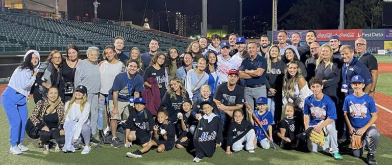 Benny Pinczewski (arms folded) who has been banned from entering Madison Square Garden, has long been active in city youth sports and is a co-founder of the Borough Cup, a citywide youth baseball tournament. Photo: Borough Cup staff