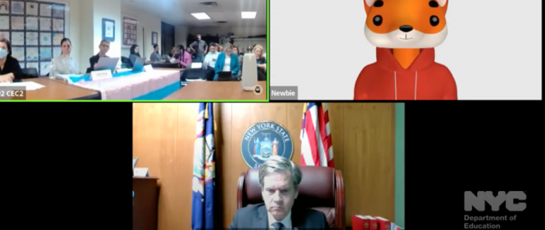 Brad Holyman-Sigal (bottom screen) attending a March 20 District 2 school board meeting, where a resolution passed that called for a “review” of trans women playing school sports. He later slammed it as bigoted and lacking evidence.