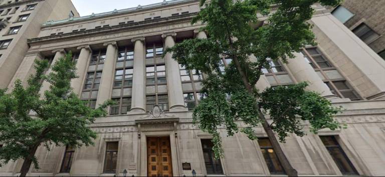 The exterior of Regis High School on E. 84th St. Alleged child abuse by a camp counselor occurred during an April weekend program, resulting in the parent of the child filing a lawsuit against the school on June 22nd.