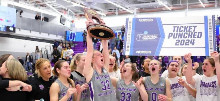 <b>The NYU women’s basketball team celebrates after beating Scranton in the Division III Elite Eight championship</b>. Photo: NYU Athletics