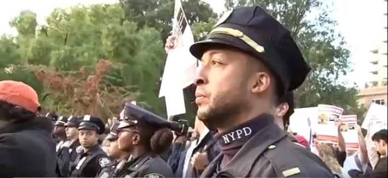 NYPD officers in Washington Square kept peace between pro-Palestine and pro-Israel demonstrators on Oct. 17. Photo: ABC News7