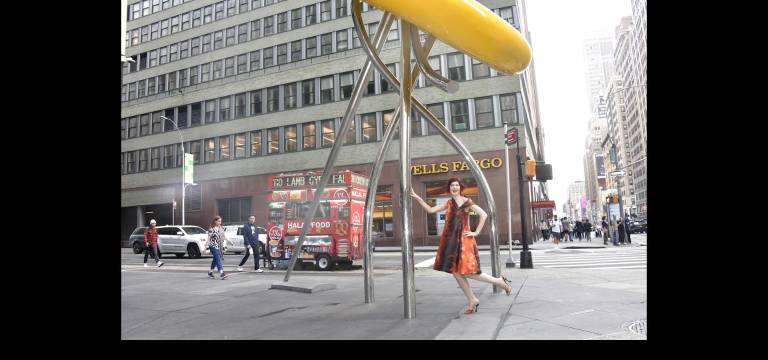 Karen Rempel frolics under the Big Button.